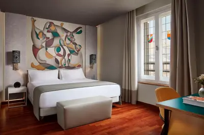 Cama o camas de una habitación en Avani Alonso Martinez