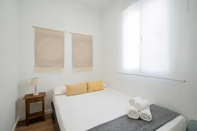 Cama o camas de una habitación en Quiet and cosy flat in N. Salamanca