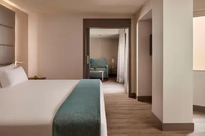 Cama o camas de una habitación en NH Madrid Zurbano