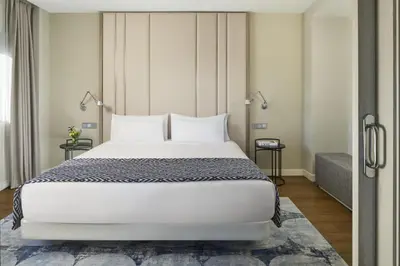Cama o camas de una habitación en NH Madrid Ventas