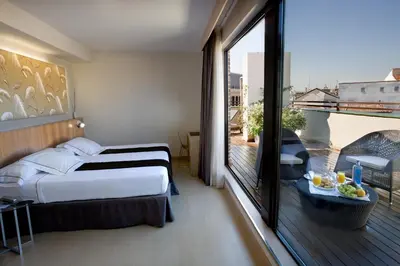 Cama o camas de una habitación en Hotel Opera