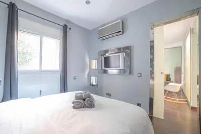 Cama o camas de una habitación en MyHouseSpain - Moderno apartamento a escasos metros del Bernabeu
