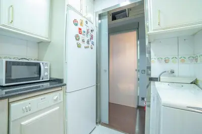 Una cocina o zona de cocina en MyHouseSpain - Moderno apartamento a escasos metros del Bernabeu