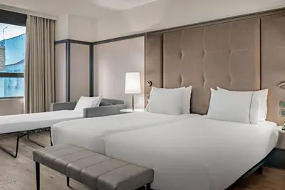 Cama o camas de una habitación en AC Hotel Avenida de América by Marriott