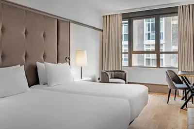 Cama o camas de una habitación en AC Hotel Avenida de América by Marriott