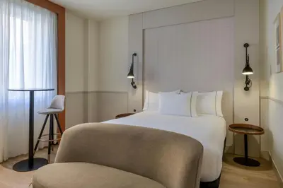 Cama o camas de una habitación en AC Hotel Los Vascos by Marriott