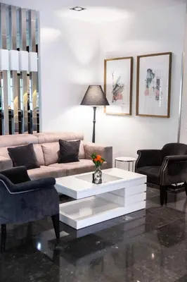 Zona de estar de Hotel Serrano