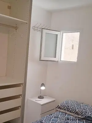 Cama o camas de una habitación en HABITACION EN CHUECA, CENTRO DE MADRID