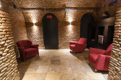 Zona de estar de Petit Palace Arenal
