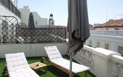 Un balcón o terraza de Hotel Moderno Puerta del Sol