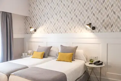 Cama o camas de una habitación en BYPILLOW Velázquez 45