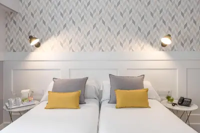 Cama o camas de una habitación en BYPILLOW Velázquez 45