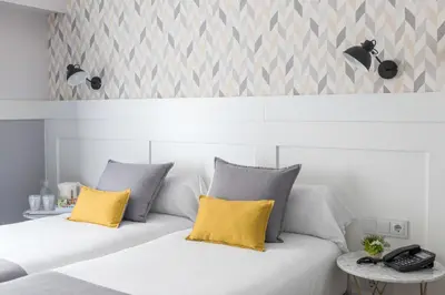 Cama o camas de una habitación en BYPILLOW Velázquez 45
