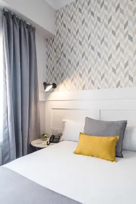 Cama o camas de una habitación en BYPILLOW Velázquez 45