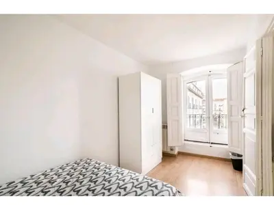 Cama o camas de una habitación en Apartamento en el centro de Madrid (chueca)