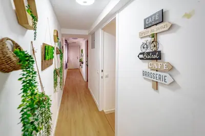 Una televisión o centro de entretenimiento en Apartamentos Preciados
