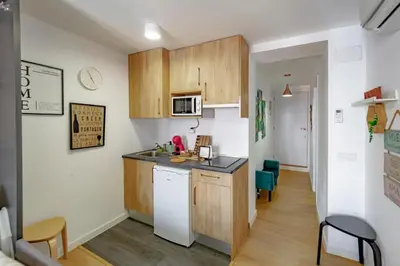 Una cocina o zona de cocina en Apartamentos Preciados