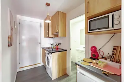 Una cocina o zona de cocina en Apartamentos Preciados