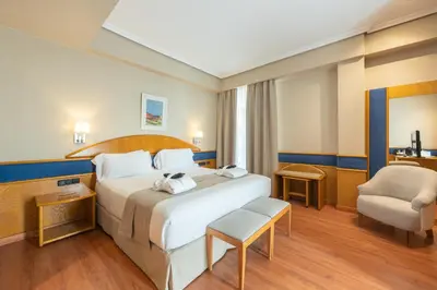 Cama o camas de una habitación en Agumar Atocha