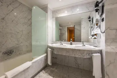 Un baño de Agumar Atocha