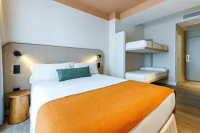 Cama o camas de una habitación en Petit Palace Puerta del Sol