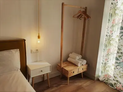 Cama o camas de una habitación en Hostal Manuela by gaiarooms