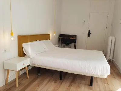 Cama o camas de una habitación en Hostal Manuela by gaiarooms
