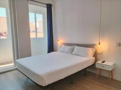 Cama o camas de una habitación en Hostal Manuela by gaiarooms