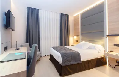 Cama o camas de una habitación en Hotel Liabeny