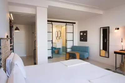 Cama o camas de una habitación en 7 Islas Hotel