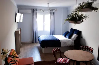 Cama o camas de una habitación en Apartamento por temporada Centro Diseño Madrid