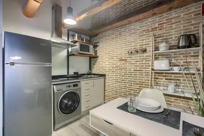 Una cocina o zona de cocina en Apartamento Plaza de España 5