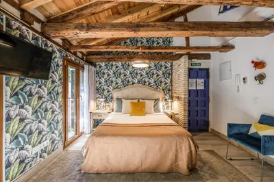 Cama o camas de una habitación en AmazINN Boutique Madrid Plaza de España