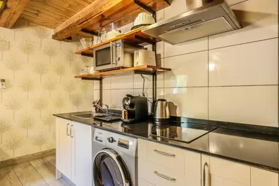 Una cocina o zona de cocina en Apartamento Plaza de España 12