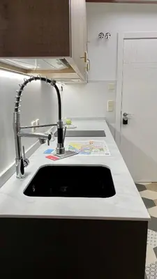 Una cocina o zona de cocina en Madrid Villa Suites Serenidad