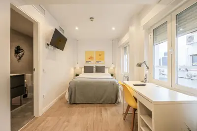 Cama o camas de una habitación en Arteria Madrid Chamberí
