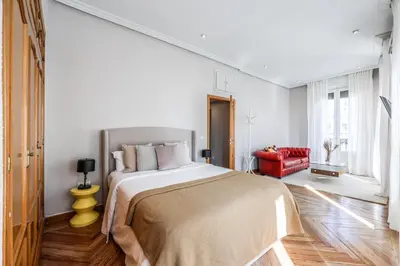 Cama o camas de una habitación en AmazINN Boutique Madrid Canalejas