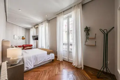 Cama o camas de una habitación en AmazINN Boutique Madrid Canalejas