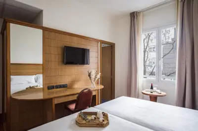 Cama o camas de una habitación en Negresco Gran Via