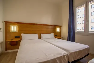 Cama o camas de una habitación en Negresco Gran Via
