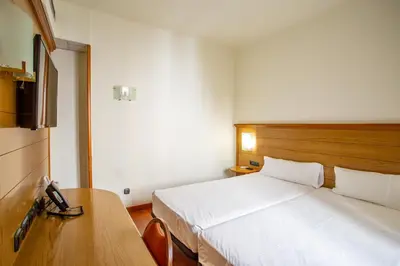 Cama o camas de una habitación en Negresco Gran Via