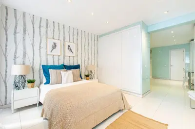 Cama o camas de una habitación en Apartamento Edificio Gran Via -Quinto Piso Sin Ascensor-