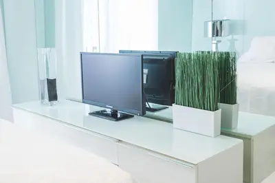 Una televisión o centro de entretenimiento en Apartamento Edificio Gran Via -Quinto Piso Sin Ascensor-
