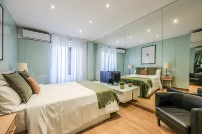 Cama o camas de una habitación en AmazINN Stay Madrid San Bernardo