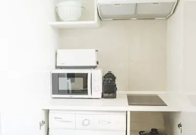 Una cocina o zona de cocina en Apartamento Gran Via IV -Quinto Piso Sin Ascensor-
