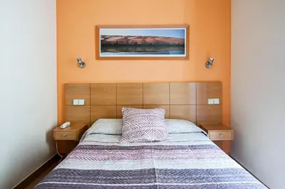 Cama o camas de una habitación en Hostal Inter Puerta del Sol AUTO CHECK IN