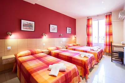Cama o camas de una habitación en Hostal Inter Plaza Mayor AUTO CHECK IN
