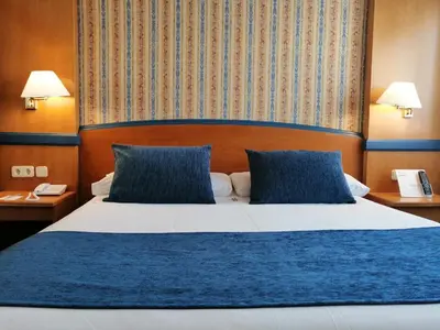 Cama o camas de una habitación en Gran Versalles