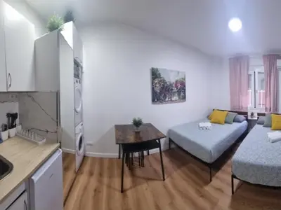 Cama o camas de una habitación en Estudio Madrid Centro MALASAÑA
