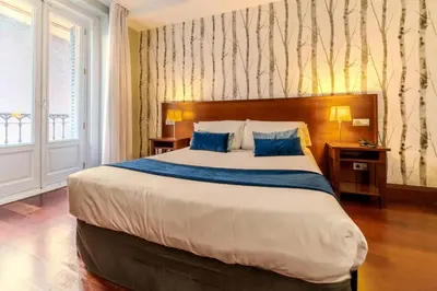 Cama o camas de una habitación en ITC Infantas by Soho Boutique